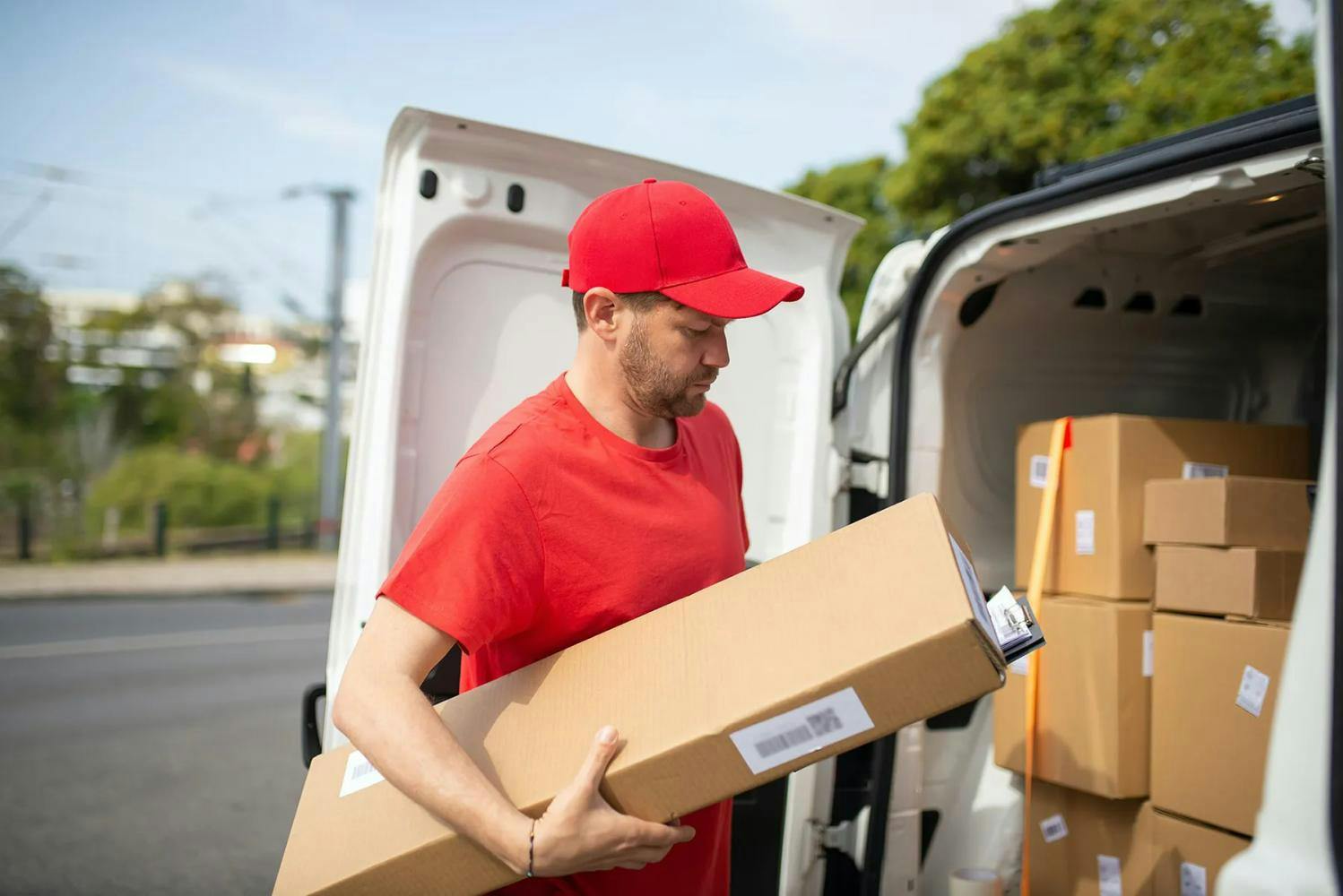 Courier delivering parcels