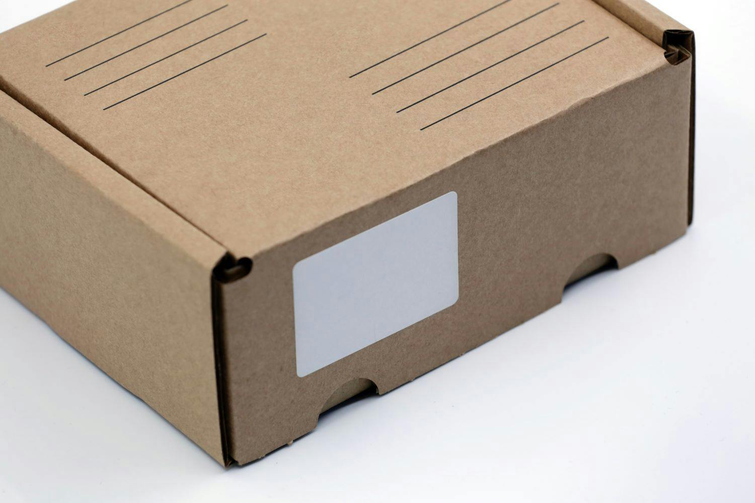 Box with blank label on white background