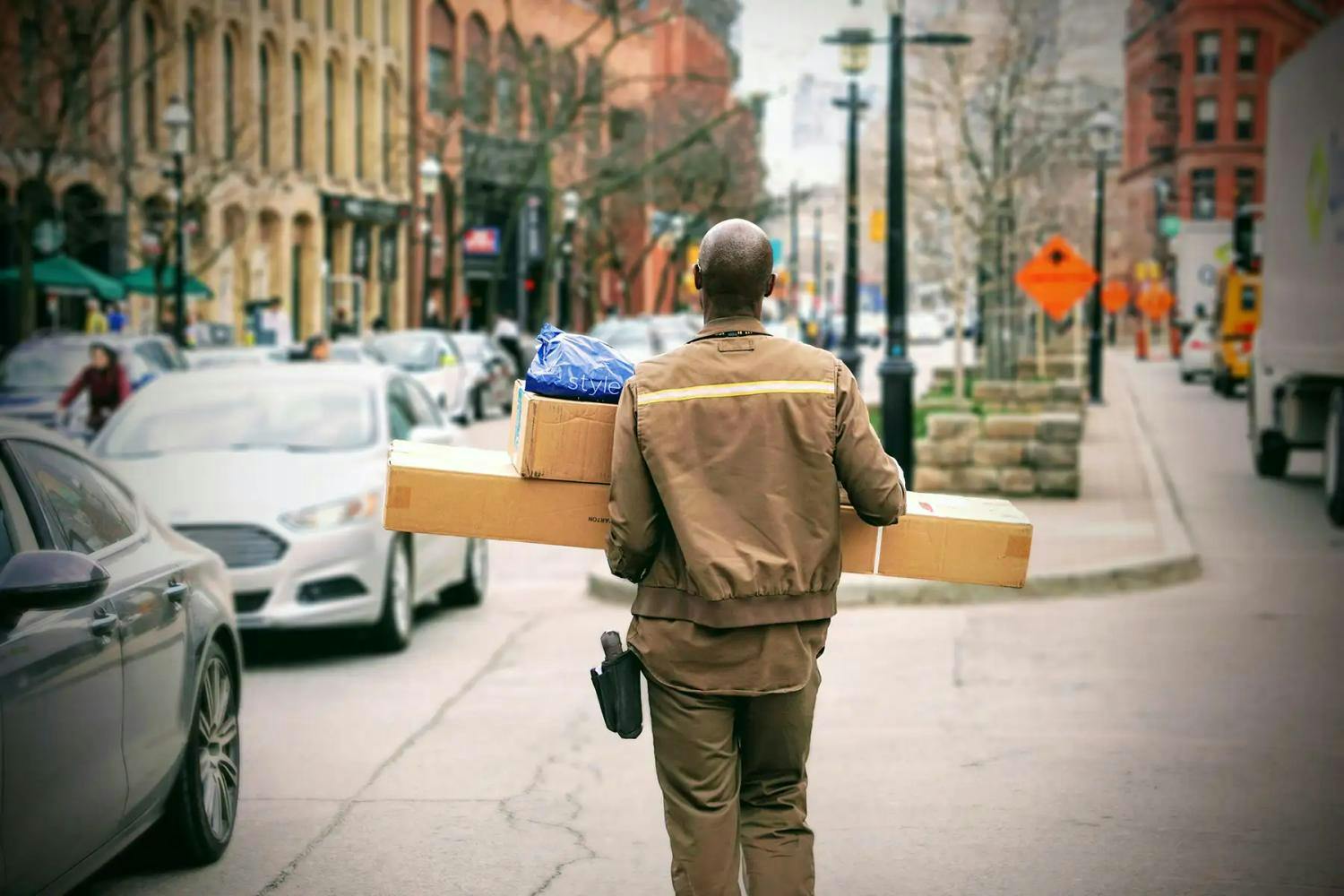 Courier delivering packages