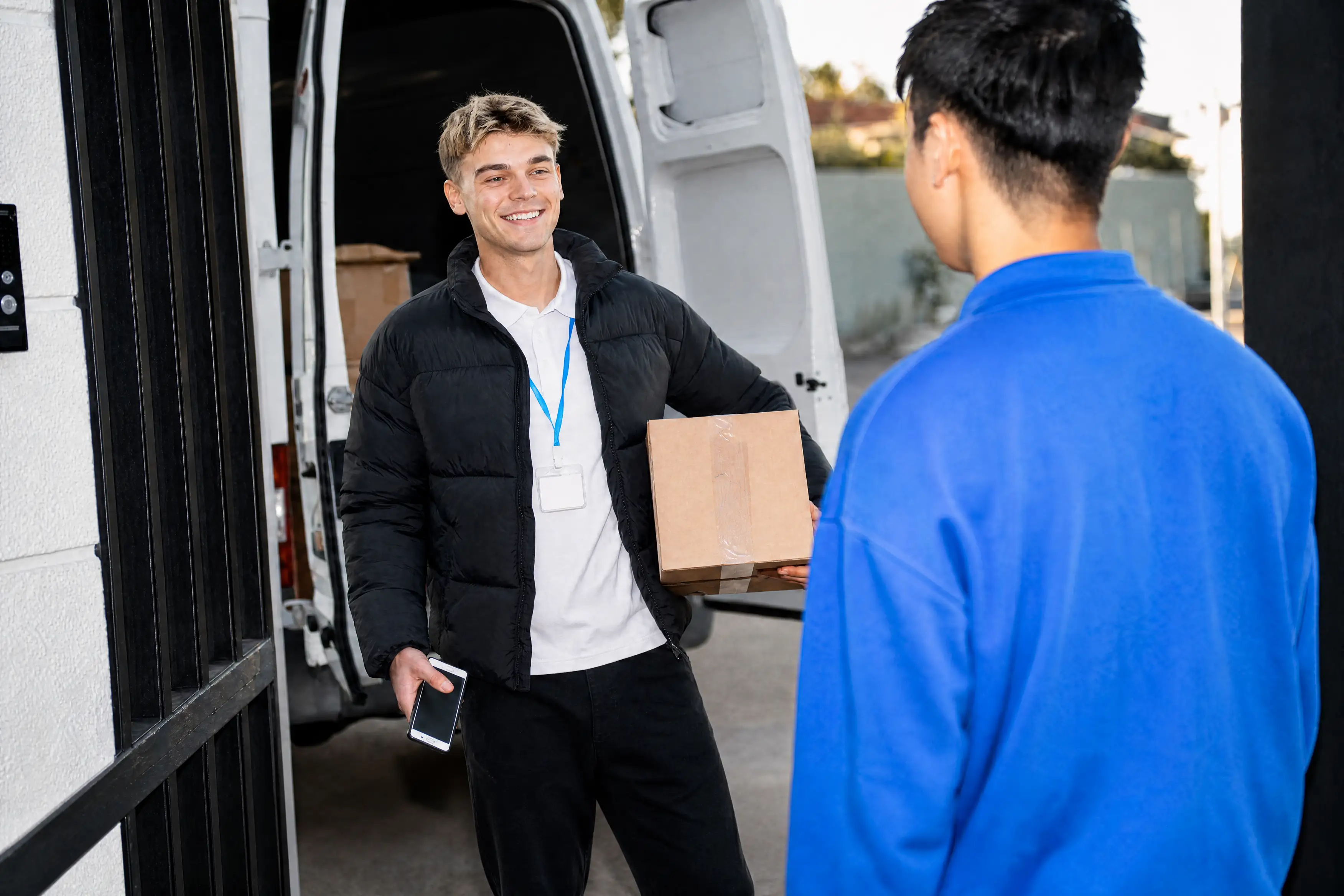 courier handing package to customer 2 courier handing package to customer 2