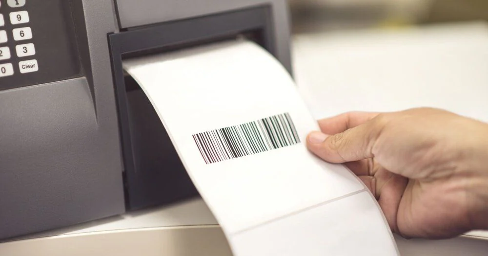 Thermal printer printing a barcode shipping label